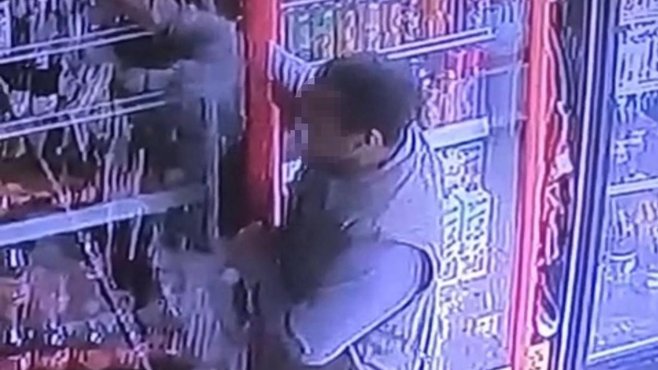 Diyarbakır Kayapınar'da marketten içecek çalan kişi güvenlik kamerasında