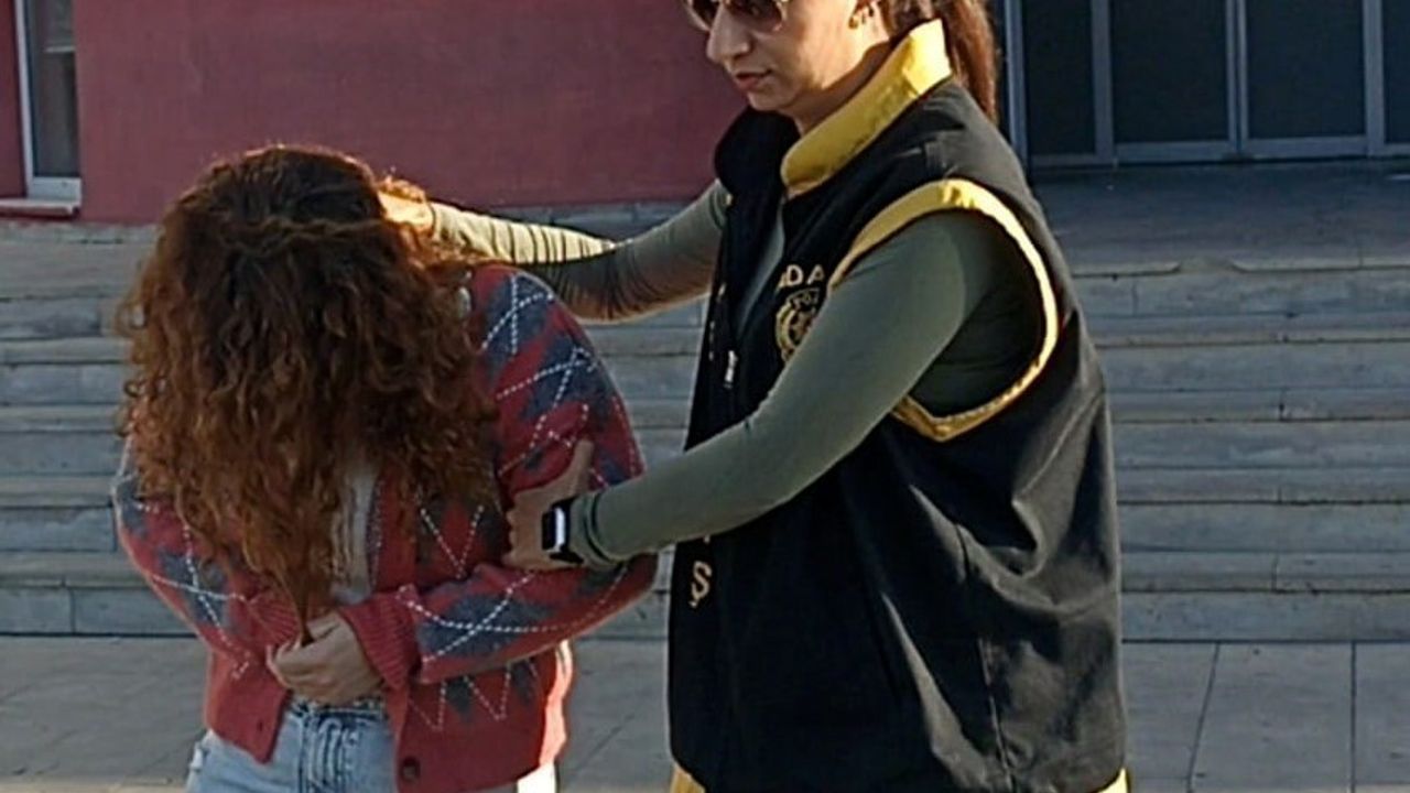 Adana'da silahlı yağma suçundan aranan kadın F.K. yakalandı