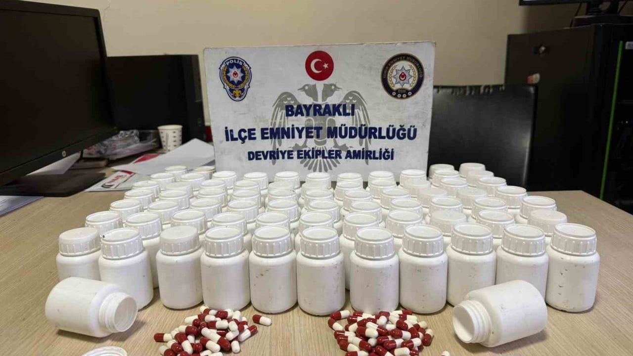 İzmir'de mezarlıkta bulunan poşetten 4 bin 357 uyuşturucu hap çıktı