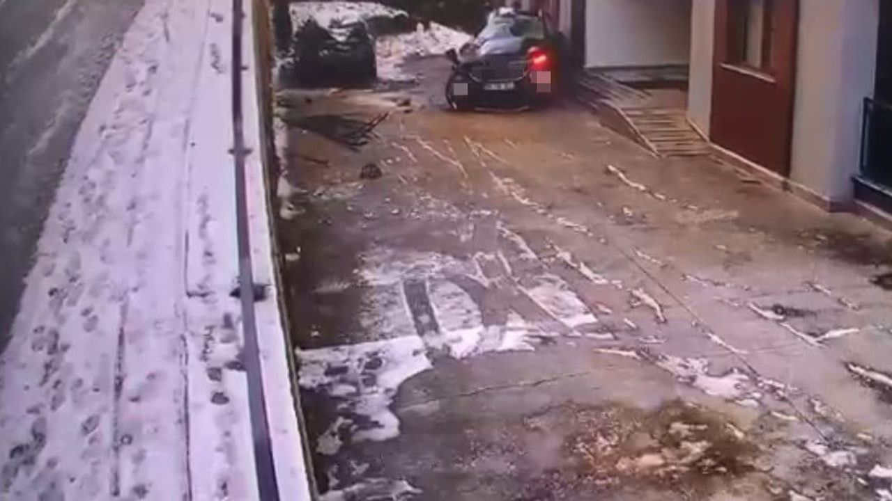Trabzon'da buzlanan yolda cip sitenin bahçesine uçtu