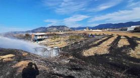 Bucak'ta Gündoğdu köyünde arazi yangını itfaiye tarafından söndürüldü