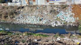 Koza Mahallesi'nde açık atık su deresi mahalleyi perişan ediyor