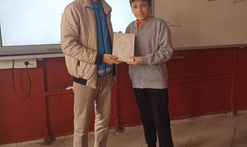 Emet'te Ashapoğlu Ortaokulu öğrencilerine Kur'an-ı Kerim armağan edildi