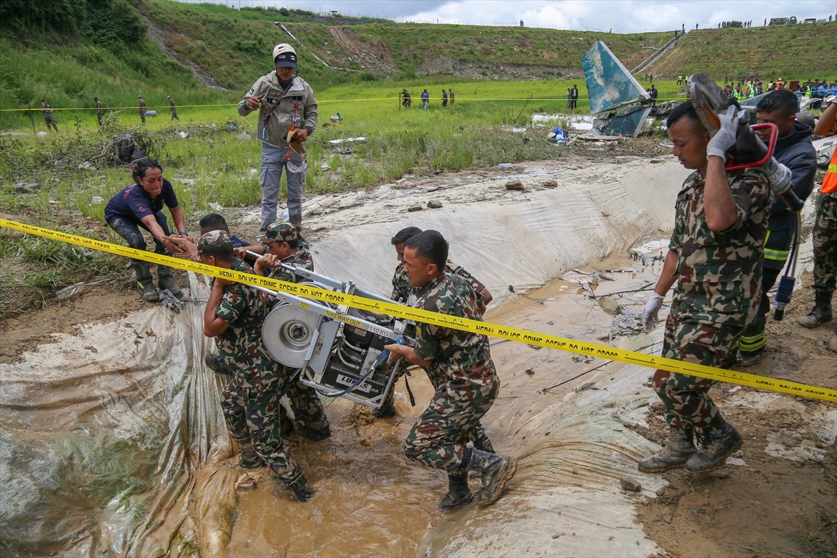 Nepal'in başkenti Katmandu'daki Tribhuvan Uluslararası Havalimanı'nda 19 kişiyi taşıyan bir uçak...