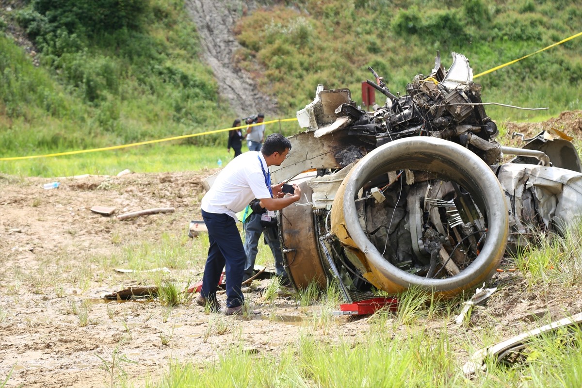 Nepal'in başkenti Katmandu'daki Tribhuvan Uluslararası Havalimanı'nda 19 kişiyi taşıyan bir uçak...