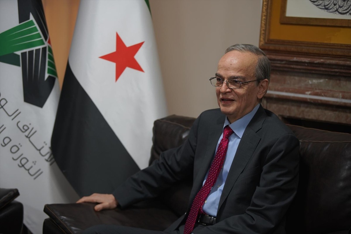 Suriye Muhalif ve Devrimci Güçler Ulusal Koalisyonu (SMDK) Başkanı Hadi el-Bahra, Beşşar Esed...