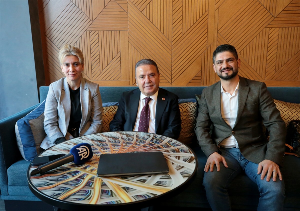 Antalya Büyükşehir Belediye Başkanı Muhittin Böcek (ortada), Anadolu Ajansının (AA) gözünden...