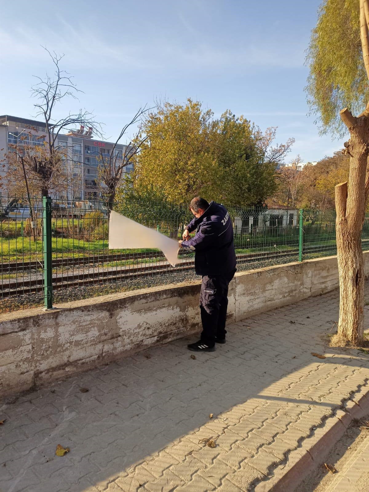 GERMENCİK BELEDİYESİ, İLÇE ESTETİĞİNİ BOZDUĞU TESPİT EDİLEN İZİNSİZ İLAN, AFİŞ VE REKLAM...